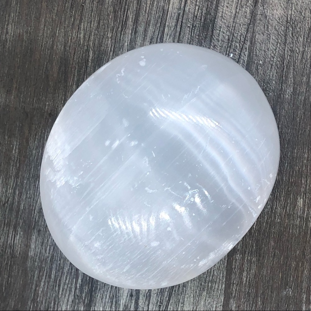 Selenite shiny polished crystal palm stone